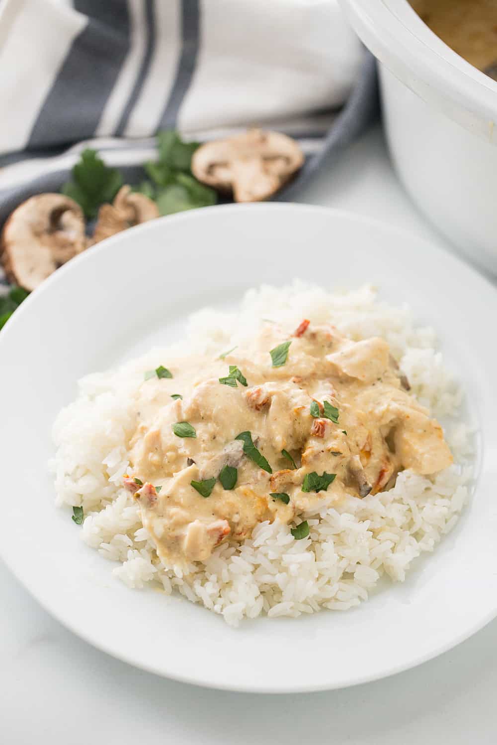 Slow Cooker Creamy Italian Chicken - Slow cooker creamy Italian chicken is easy, creamy, and comforting. You and your family will love this simple weeknight meal! #slowcooker #crockpot #chicken #recipe #chickenrecipe #halfscratched #italianchicken #cooking #easyrecipe