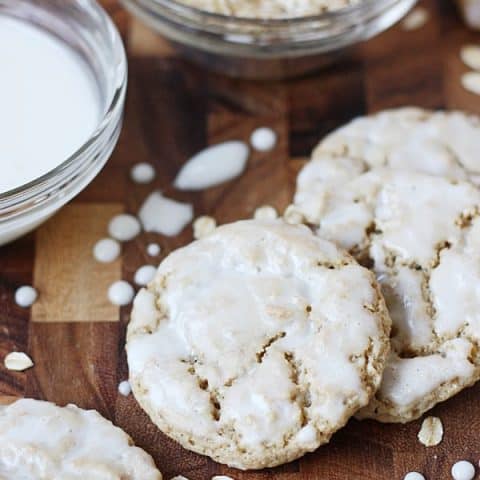 Iced Oatmeal Cookies -- These old-fashioned iced oatmeal cookies are one of my most-requested recipes thanks to a soft, chewy, perfectly-spiced oatmeal cookie topped with a thin layer of vanilla icing. | halfscratched.com
