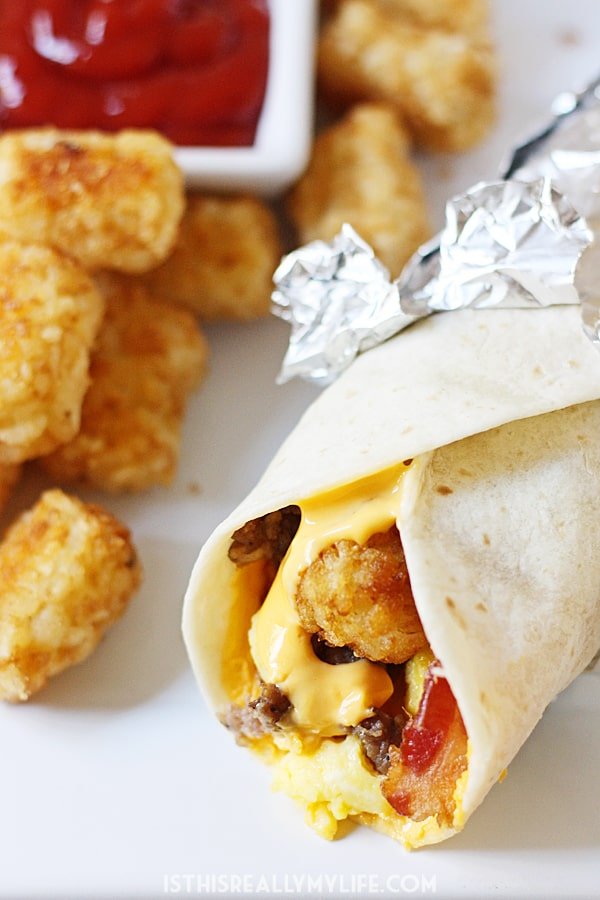 Copycat Sonic Ultimate Meat & Cheese Burrito - This copycat Sonic Ultimate Meat & Cheese Burrito recipe comes as close to the drive-thru original as possible. Don't forget to throw in an extra side of tots! | halfscratched.com