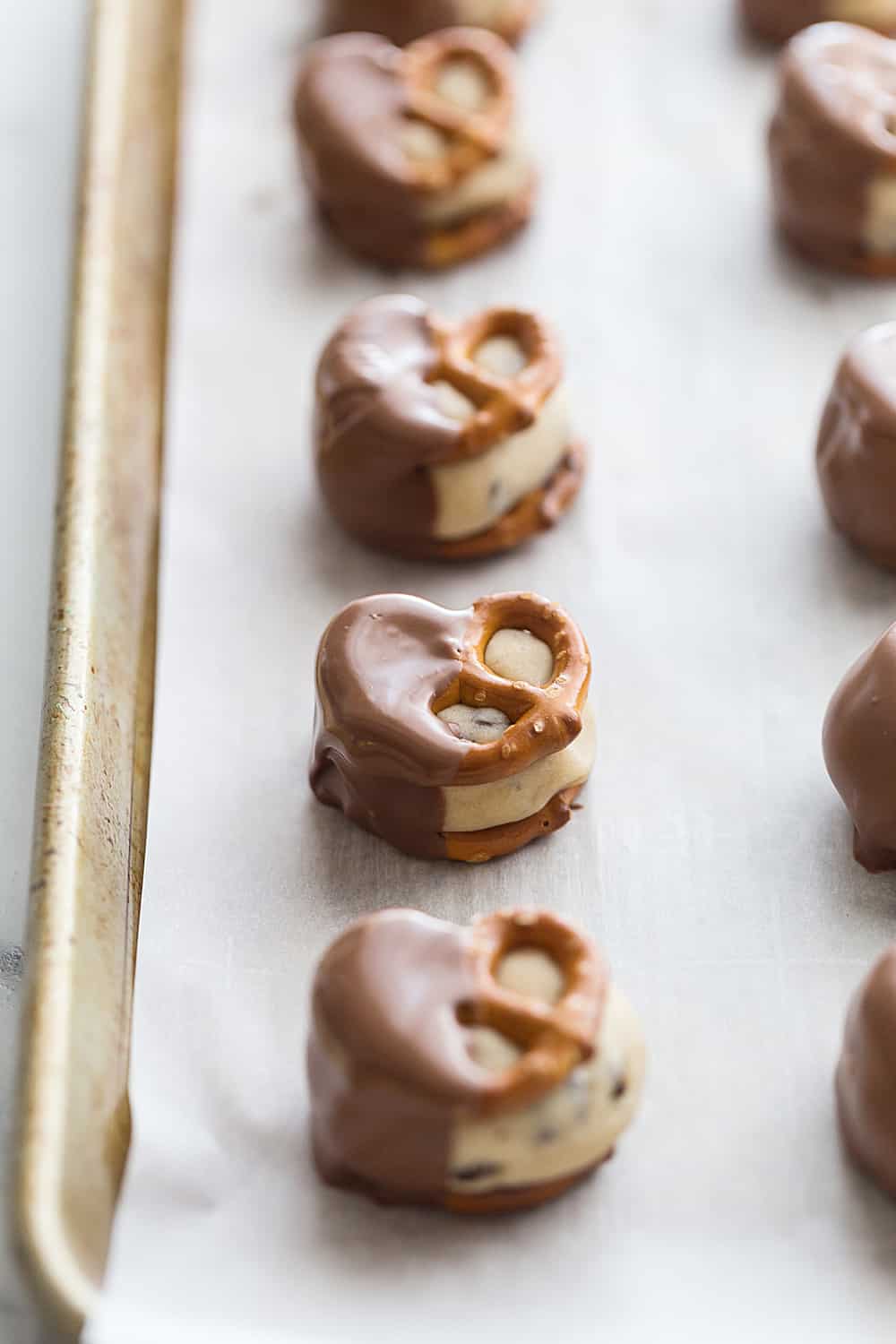 Cookie Dough Pretzel Bites ready on a baking tray.