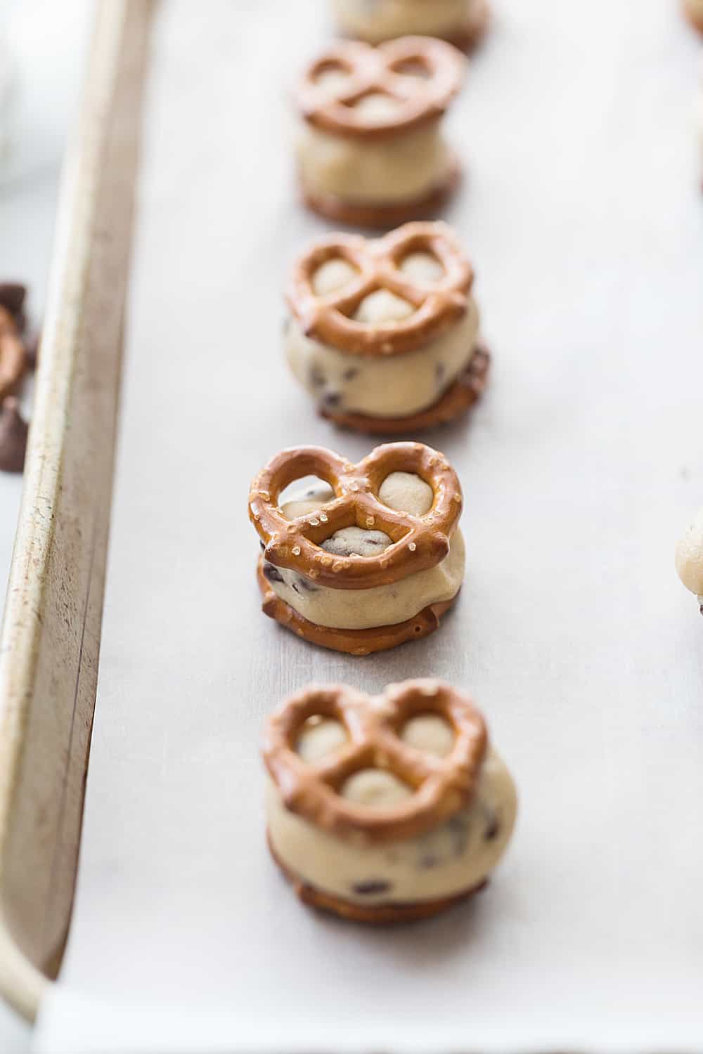 Cookie Dough Pretzel Bites on a baking tray.