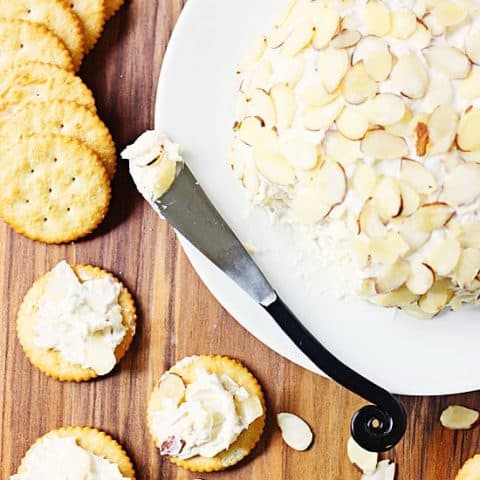 Pineapple Cream Cheese Ball -- This pineapple cream cheese ball features crushed pineapple, cheddar cheese and green onions ... a combination that is crazy delicious! | halfscratched.com