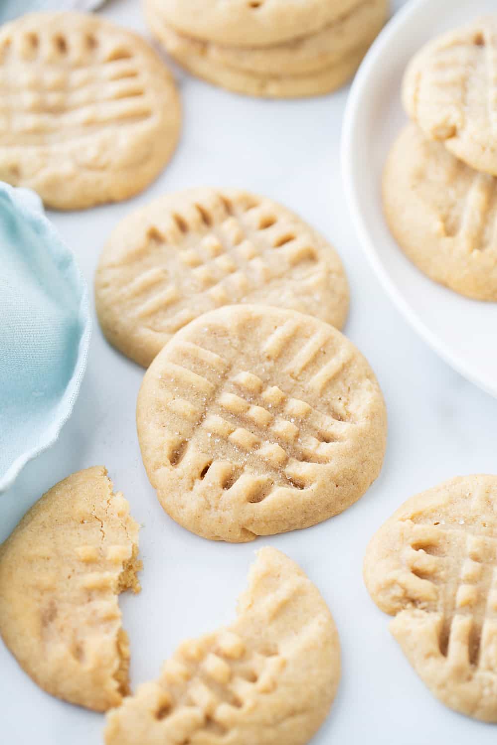 Old-Fashioned Peanut Butter Cookies - Old-fashioned peanut butter cookies are soft, chewy, and oh, so good! Friends and family (and my taste buds) always rave when I bake a batch. #halfscratched #peanutbutter #cookies #cookierecipe #baking #peanutbuttercookies #desserts #sweets #cookies