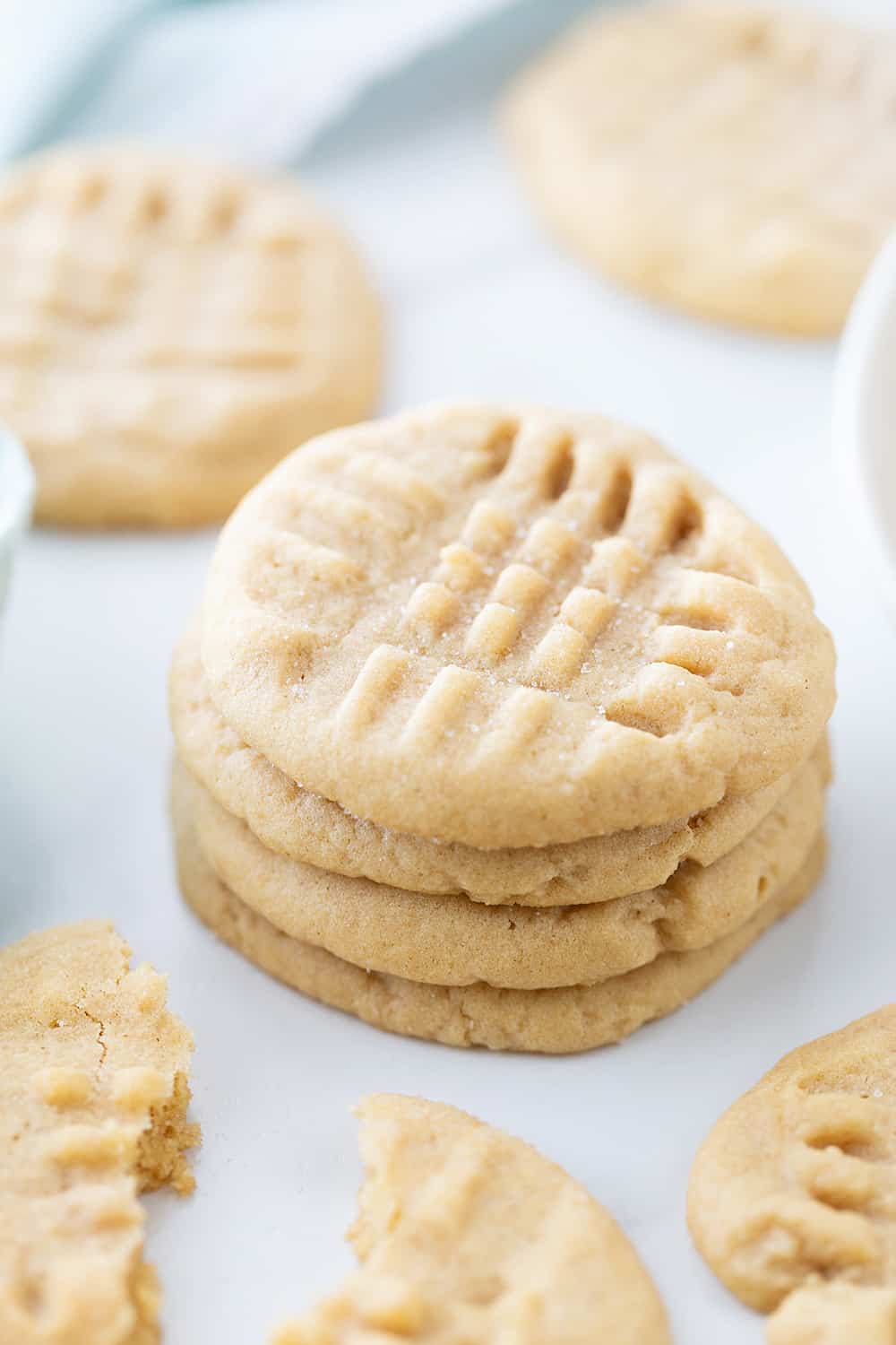 Old-Fashioned Peanut Butter Cookies - Old-fashioned peanut butter cookies are soft, chewy, and oh, so good! Friends and family (and my taste buds) always rave when I bake a batch. #halfscratched #peanutbutter #cookies #cookierecipe #baking #peanutbuttercookies #desserts #sweets #cookies