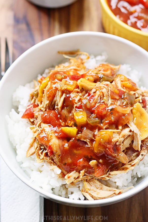 Slow Cooker Mango Chicken -- You will love this slow cooker mango chicken. It requires only 4 ingredients and takes only 5 minutes of prep. Double the recipe and freeze the leftovers! | halfscratched.com