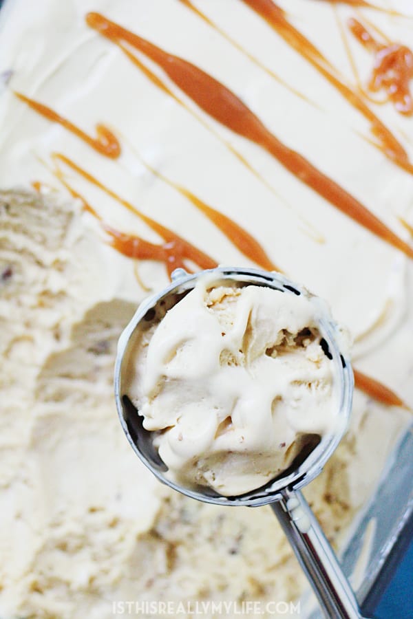 Salted Caramel Pecan Ice Cream - This salted caramel pecan ice cream boasts a decadent caramel swirl and chopped pecans. It's quite possibly the best salted ice cream you'll ever taste. | halfscratched.com
