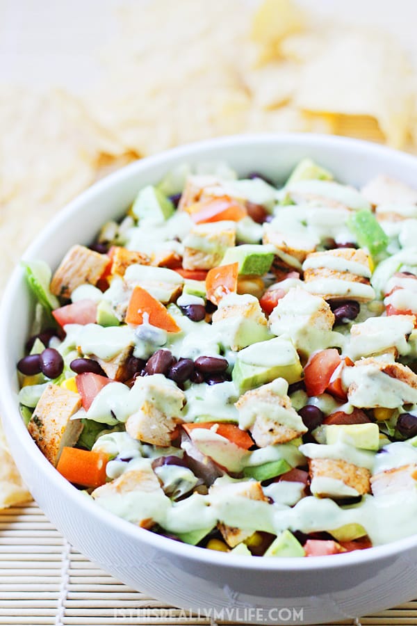 Tequila Lime Chopped Chicken Salad - This tequila lime chopped chicken salad is perfect for southwest salad lovers with its tequila lime-marinated chicken and spicy avocado ranch dressing. | halfscratched.com
