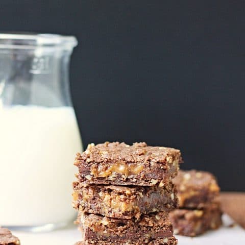 German Chocolate Caramel Brownies -- German chocolate caramel brownies are a tasty variation on your typical brownie recipe. Plus they use a cake mix so whipping up a batch is even easier! | halfscratched.com