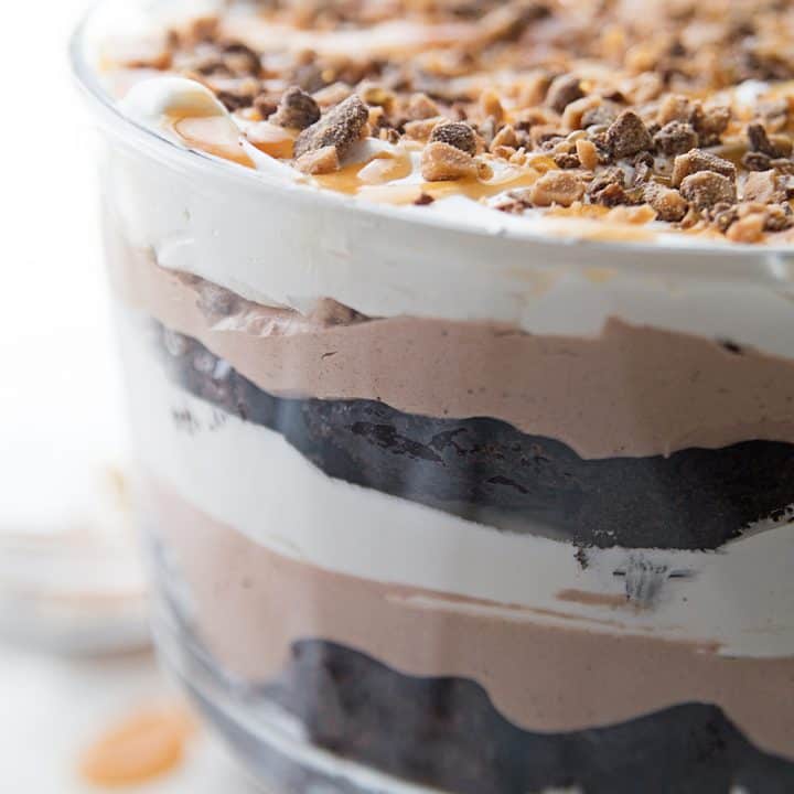 Chocolate Brownie Trifle - Chocolate brownie trifle features layers of rich, chocolate brownies, fudge pudding, whipped topping, toffee, and caramel. What's not to love? #trifle #brownie #dessert #halfscratched #chocolatetrifle #brownietrifle #sweet #baking