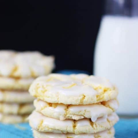 Easy Lemon Cookies with Lemon Glaze -- these cookies use lemon cake mix and lemon pudding and not much else to make a super delicious dessert!