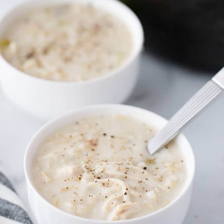 Creamy Chicken and Rice Soup - Creamy chicken and rice soup is a hearty meal with simple ingredients like brown rice, celery, onion, and chicken. Total family favorite! #halfscratched #soup #souprecipe #chickensoup #ricesoup #easyrecipe #maindish