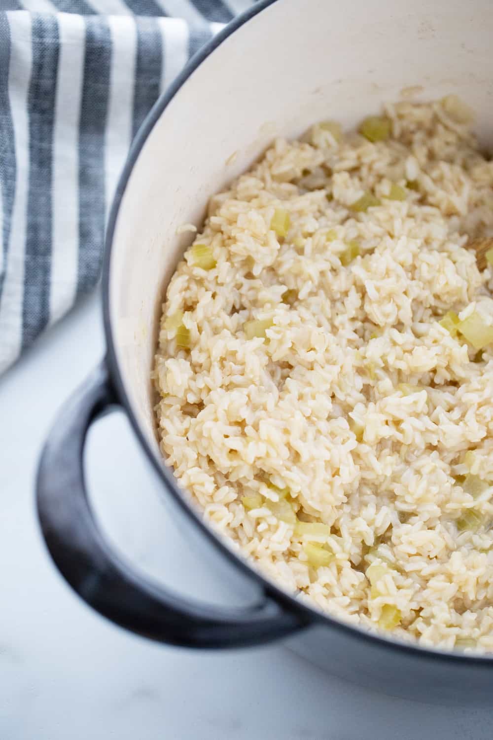 Creamy Chicken and Rice Soup - Creamy chicken and rice soup is a hearty meal with simple ingredients like brown rice, celery, onion, and chicken. Total family favorite!