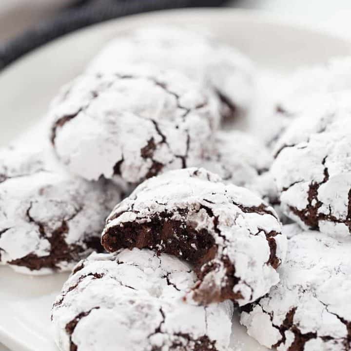 Double Chocolate Crinkle Cookies - Instant espresso powder + mini semisweet chocolate chips = next-level double chocolate crinkle cookies. One bite and you'll be hooked! #halfscratched #chocolate #cookies #crinklecookies #baking #cookierecipe #holidayrecipe #easyrecipe