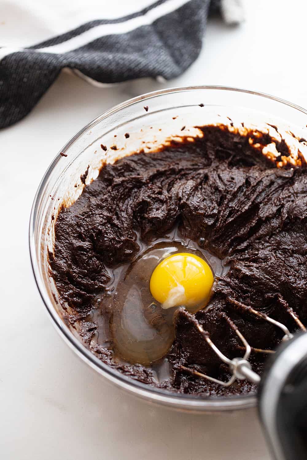 Double Chocolate Crinkle Cookies - Instant espresso powder + mini semisweet chocolate chips = next-level double chocolate crinkle cookies. One bite and you'll be hooked! #halfscratched #chocolate #cookies #crinklecookies #baking #cookierecipe #holidayrecipe #easyrecipe 