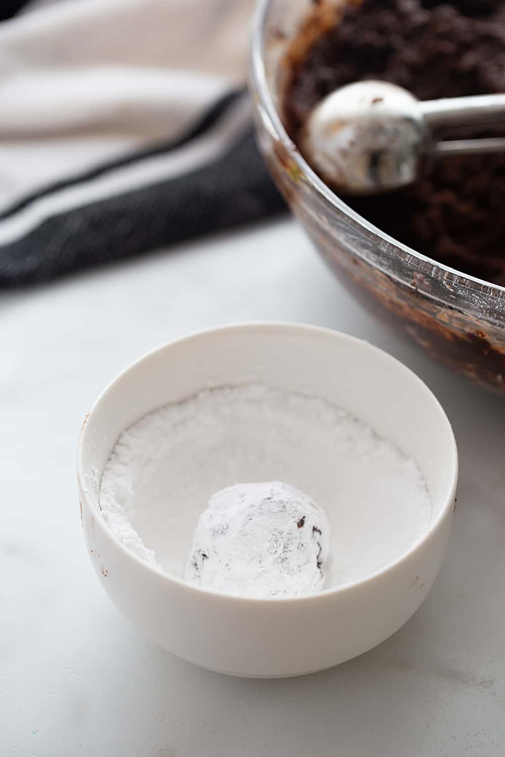 Double Chocolate Crinkle Cookies - Instant espresso powder + mini semisweet chocolate chips = next-level double chocolate crinkle cookies. One bite and you'll be hooked! #halfscratched #chocolate #cookies #crinklecookies #baking #cookierecipe #holidayrecipe #easyrecipe 