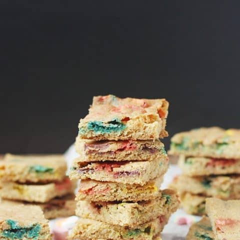Lucky Charms Bar Cookies -- soft, chewy and super colorful. Perfect for St Patricks Day or any day if you are a fan of Lucky Charms!