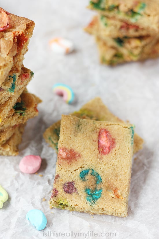 Lucky Charms Bar Cookies -- soft, chewy and super colorful. Perfect for St Patricks Day or any day if you are a fan of Lucky Charms!