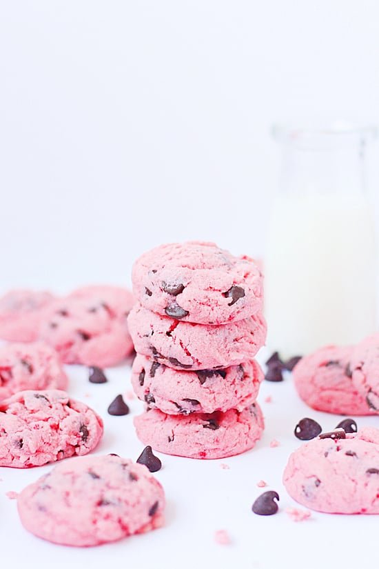 Strawberry Chocolate Chip Cake Mix Cookies -- These strawberry cake mix cookies require only five ingredients and are an easy treat for Valentine's Day. You could even dip half the cookie in chocolate! | halfscratched.com #cookies #recipe