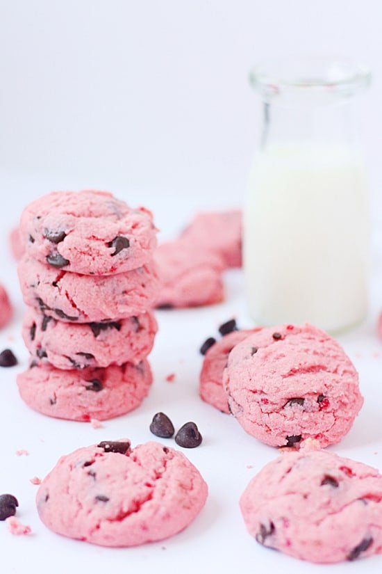 Strawberry Chocolate Chip Cake Mix Cookies -- These strawberry cake mix cookies require only five ingredients and are an easy treat for Valentine's Day. You could even dip half the cookie in chocolate! | halfscratched.com #cookies #recipe