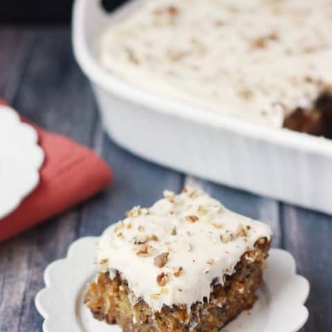 Buttemilk Glazed Carrot Cake with Cream Cheese Frosting -- my friend is famous for this cake and I can see why. The perfect carrot cake topped with a buttermilk glaze while hot and then topped with a divine cream cheese frosting. Best. Cake. Ever.