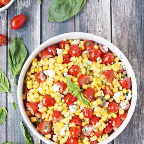 Corn salad with tomato, basil and feta -- the perfect way to highlight farm fresh corn in the summer!