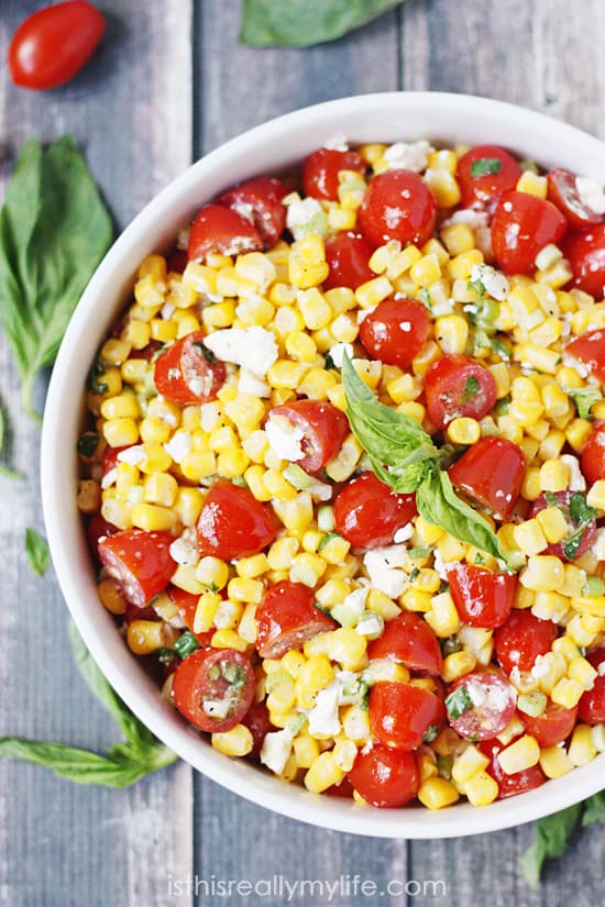 Corn salad with tomato, basil and feta -- the perfect way to highlight farm fresh corn in the summer!