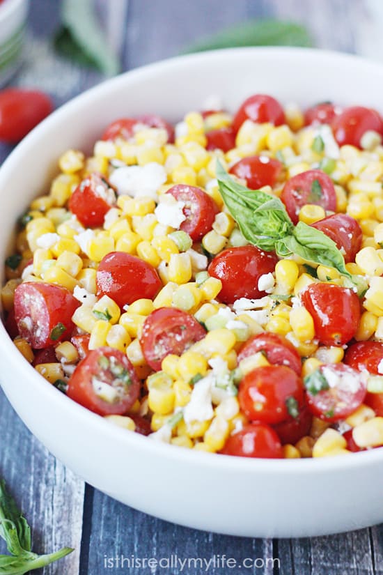 Corn salad with tomato, basil and feta -- the perfect way to highlight farm fresh corn in the summer!