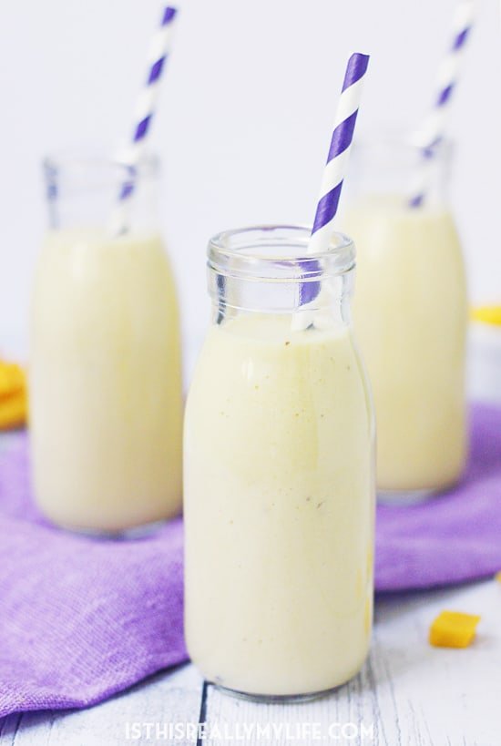 Pineapple Coconut Mango Smoothie -- This smoothie has only five ingredients and is packed with antioxidants and vitamins. It features fresh or frozen mango, frozen pineapple, Greek yogurt, coconut milk and banana. So yummy and great for workouts!