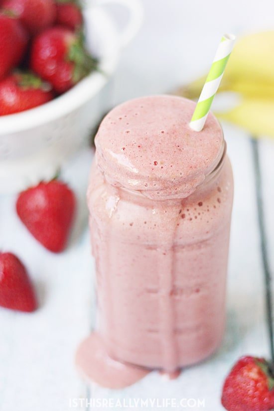 Healthy Strawberry Orange Protein Smoothie -- Orange juice, strawberries, banana and vanilla protein powder come together in this delicious healthy strawberry orange protein smoothie.