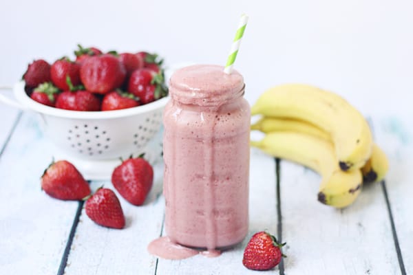 Healthy Strawberry Orange Protein Smoothie -- Orange juice, strawberries, banana and vanilla protein powder come together in this delicious healthy strawberry orange protein smoothie.