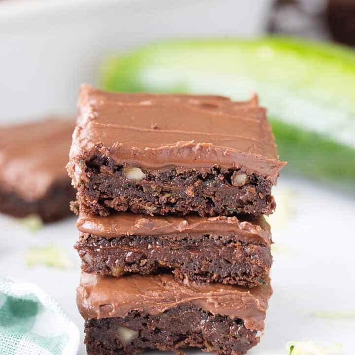 Frosted Zucchini Brownies - Frosted zucchini brownies feature a decadent chocolate flavor and rich, creamy frosting. And guess what? You can't taste zucchini in this brownie recipe! #halfscratched #brownies #brownie #recipe #baking #chocolate #zucchini #dessert #sweets