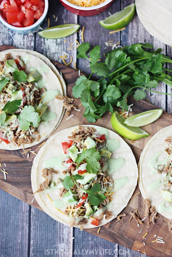 Pressure Cooker Cafe Rio Pork Tacos -- I took our favorite slow cooker Cafe Rio pork and converted it into an equally scrumptious pressure cooker Cafe Rio pork. Do not forget the creamy cilantro dressing! | halfscratched.com