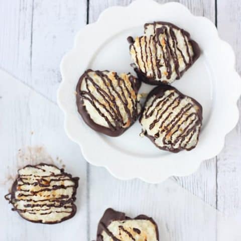 Easy Chocolate-Dipped Coconut Macaroons -- These coconut macaroons are slightly crunchy on the outside, perfectly chewy on the inside and easy to make. Dip them in dark chocolate for an irresistible treat! | halfscratched.com