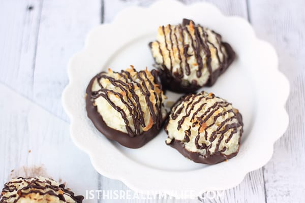 Easy Chocolate-Dipped Coconut Macaroons -- These coconut macaroons are slightly crunchy on the outside, perfectly chewy on the inside and easy to make. Dip them in dark chocolate for an irresistible treat! | halfscratched.com