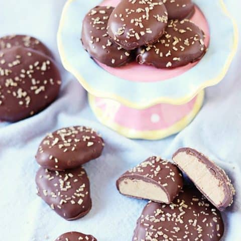 Copycat Reeses Peanut Butter Eggs -- If you buy Reeses eggs by the bagful like me, you will absolutely LOVE these copycat Reese's peanut butter eggs. Smooth, creamy, chocolaty and so easy! | halfscratched.com