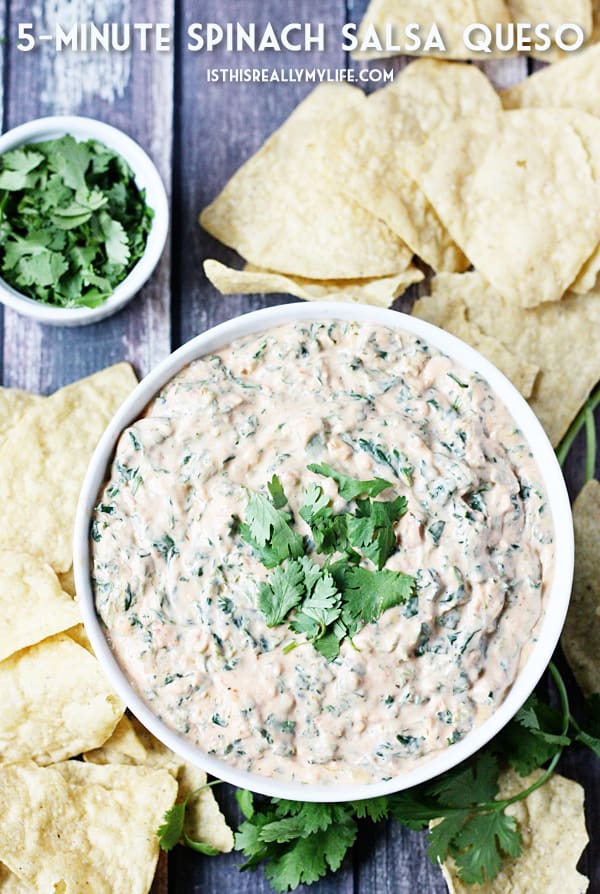 5-Minute Spinach Salsa Queso -- Need a last-minute Cinco de Mayo appetizer? Try this 5-minute spinach salsa queso dip. It is creamy, cheesy and totally addictive! | halfscratched.com