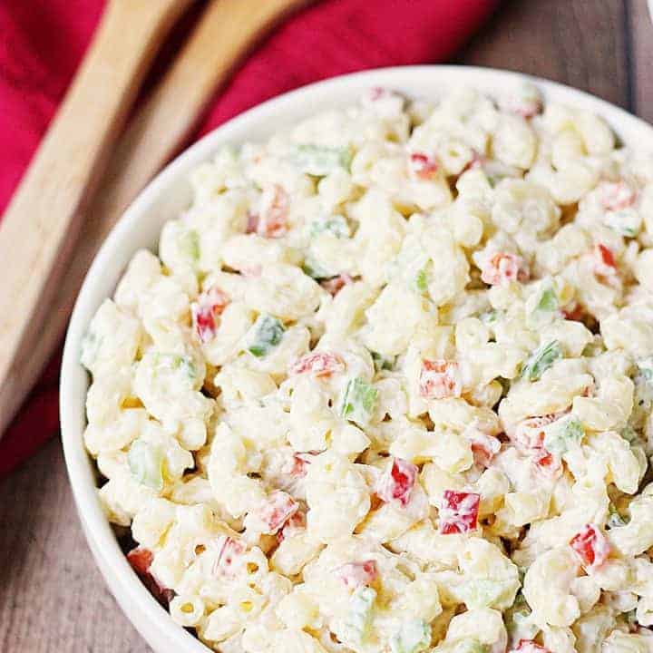 Best Ever Macaroni Salad -- Who knew macaroni salad could be incredibly easy AND incredibly delicious? This macaroni salad is just that with the perfect blend of veggies and creamy dressing with a surprise ingredient! | halfscratched.com
