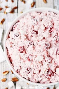 Cherry Pie Salad - Cherry pie salad requires six simple ingredients and less than six minutes to make and receives rave reviews whenever I serve it! | halfscratched.com
