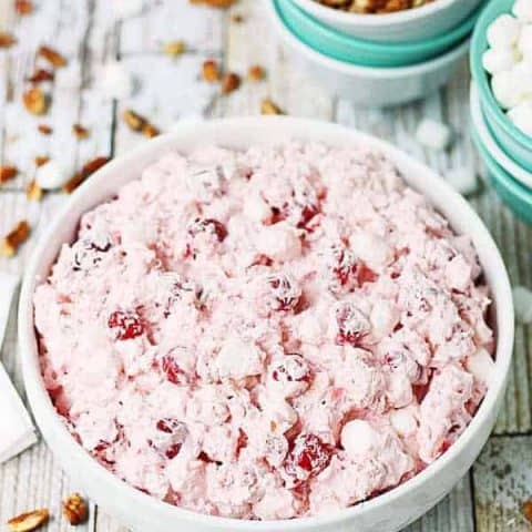 Cherry Pie Salad - Cherry pie salad requires six simple ingredients and less than six minutes to make and receives rave reviews whenever I serve it! | halfscratched.com #cherrypie #cherry #salad #dessertsalad #baking #halfscratched #cherrypiesalad #easyrecipe