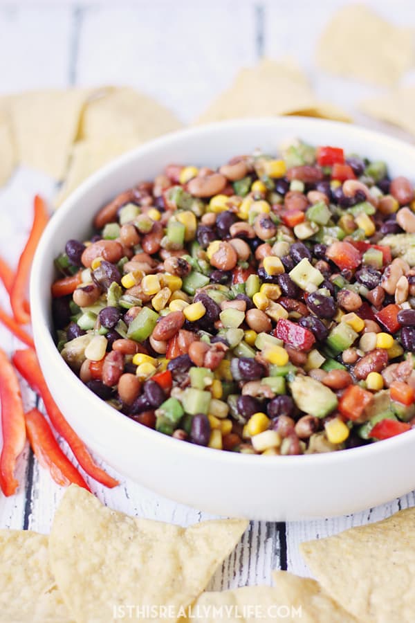 Cowboy Caviar - Cowboy caviar (a.k.a. cowboy salsa) is perfect for feeding a large crowd on Cinco de Mayo, Taco Tuesday or any day calling for amazing chips and salsa! | halfscratched.com