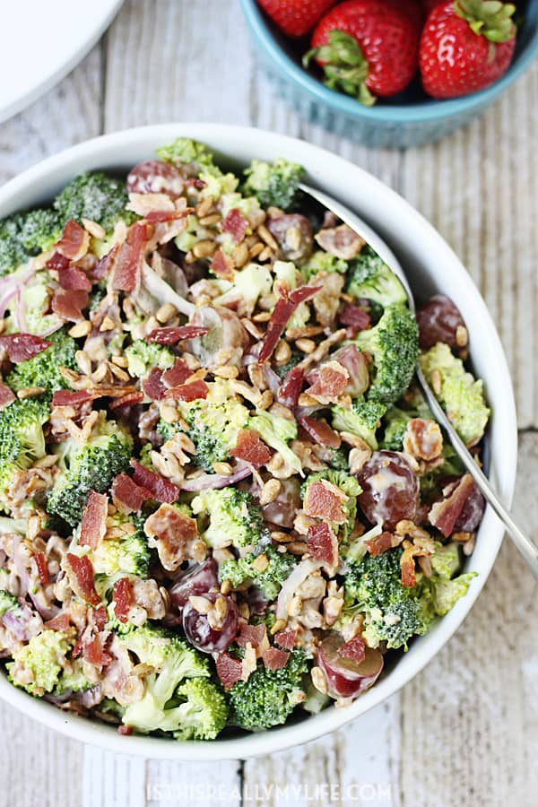 Creamy Bacon Broccoli Salad -- This creamy bacon broccoli salad is one of the best broccoli salads I've tasted. It features bacon, grapes, sunflower seeds and a creamy low-fat dressing. | halfscratched.com