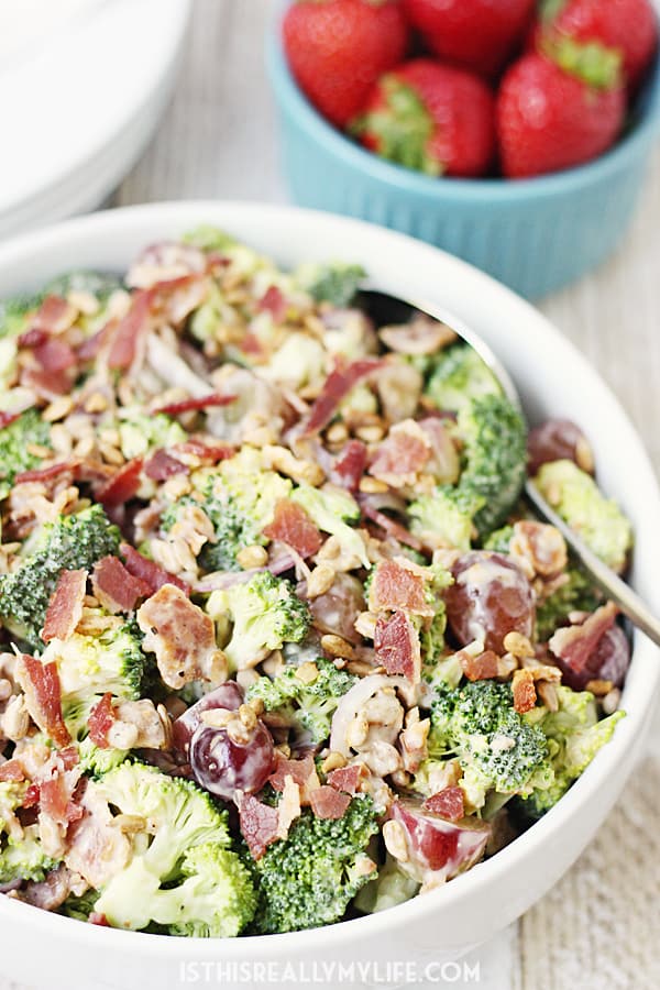 Creamy Bacon Broccoli Salad -- This creamy bacon broccoli salad is one of the best broccoli salads I've tasted. It features bacon, grapes, sunflower seeds and a creamy low-fat dressing. | halfscratched.com