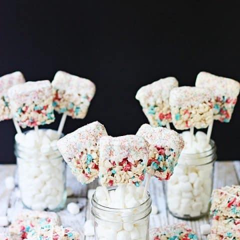 Krispie Treat Fireworks Pops -- Krispie treat fireworks pops are a fantastic last-minute 4th of July dessert—they're easy, irresistible and a total crowd pleaser! | isthisreallymyilfe.com