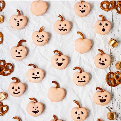 Candy-Coated Rolo Pretzel Pumpkins -- Rolo pretzels get a Halloween makeover! Candy-coated Rolo pretzel pumpkins require few ingredients and far less time than their carved counterparts! | halfscratched.com