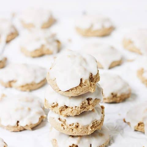 Easy Iced Spice Cookies -- Cream cheese is the secret ingredient that makes these easy iced spice cookies super soft and chewy. Vanilla icing makes them extra yummy! | halfscratched.com
