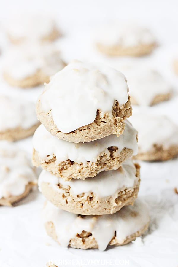 Easy Iced Spice Cookies -- Cream cheese is the secret ingredient that makes these easy iced spice cookies super soft and chewy. Vanilla icing makes them extra yummy! | halfscratched.com