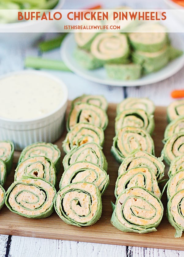 Buffalo Chicken Pinwheels -- Buffalo chicken pinwheels are a total crowd pleaser thanks to cream cheese, buffalo sauce and shredded rotisserie chicken. | halfscratched.com