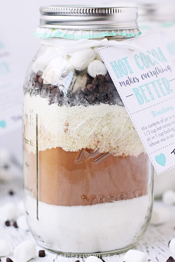 Hot Chocolate Mix in a Jar + FREE Printable Hot Cocoa Gift Tag -- Hot chocolate mix in a jar makes for the perfect holiday gift for friends and neighbors. Don't forget the cute printable gift tag! | halfscratched.com