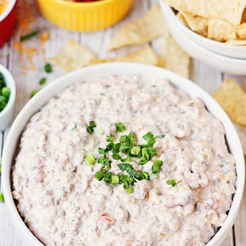 Spicy Sausage Dip -- This creamy, cheesy spicy sausage dip received rave reviews at a recent family party. It is the perfect appetizer for feeding a crowd during the holidays. | halfscratched.com