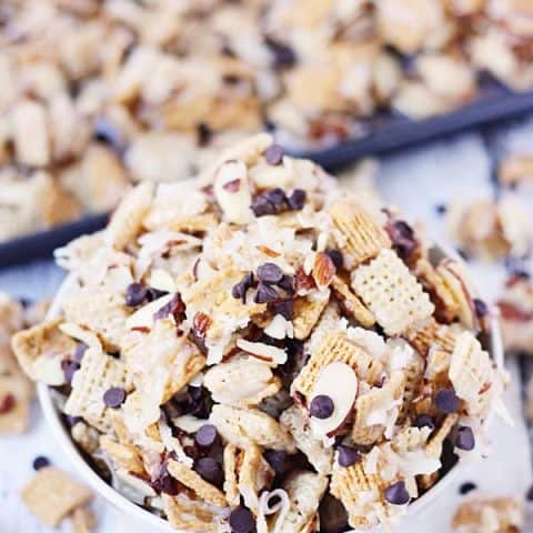 Coconut Almond Chex Mix with Grahams and Chocolate -- Coconut almond Chex mix becomes twice as irresistible after adding Golden Grahams and mini semisweet chocolate chips to the classic recipe. | halfscratched.com #recipe #chexmix